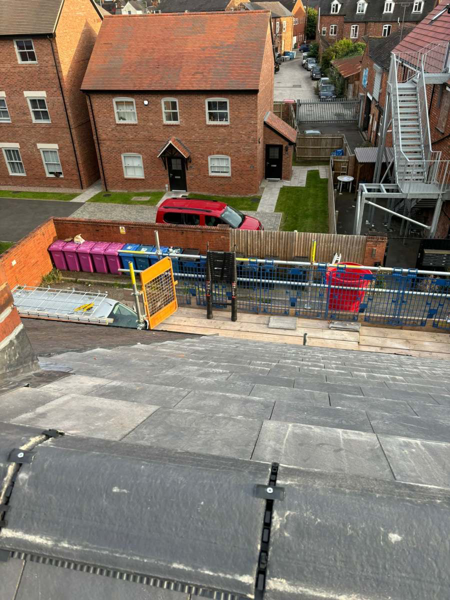 Aerial view of a completed slate re-roof over a Staffordshire terraced street