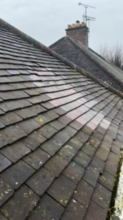 Slipped slate replacement on a Staffordshire pitched roof